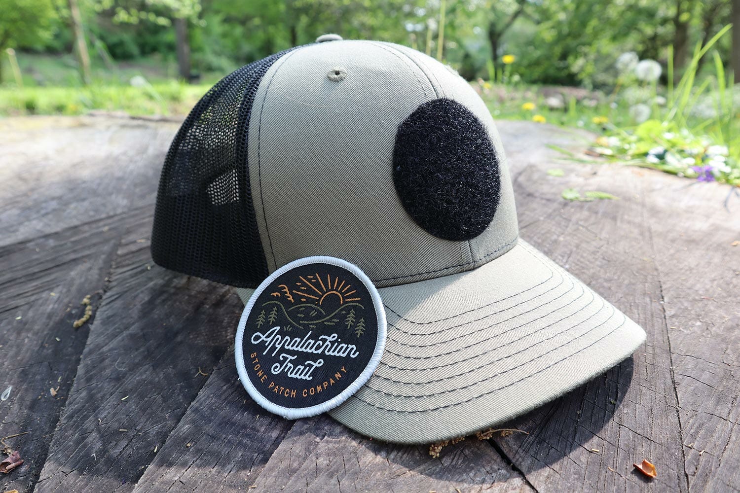 custom embroidered patch next to hat